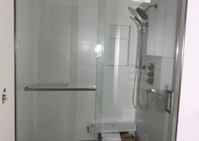 white tile shower