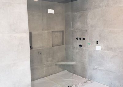 White shower with glass doors